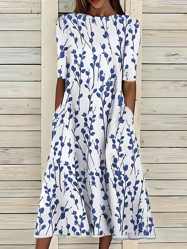 Leigh™ – Rannaline midi kleit lillemustriga ja klassikalise ümmarguse kaelusega