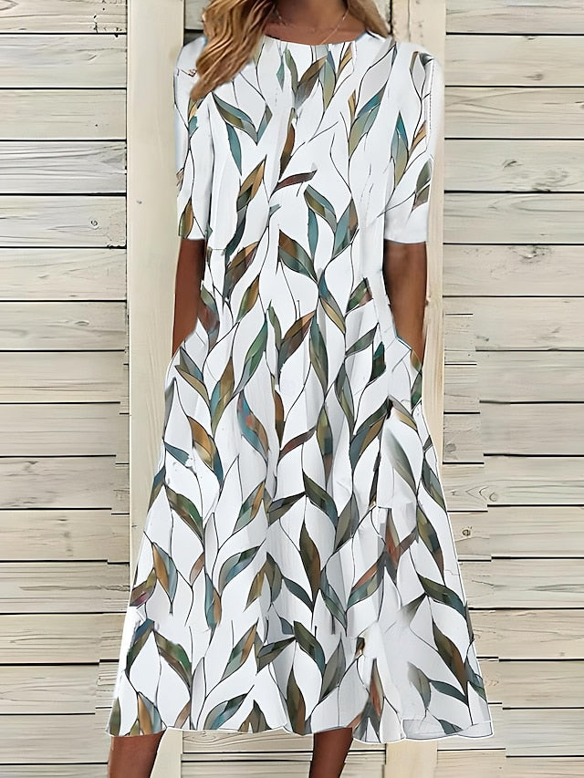 Leigh™ – Rannaline midi kleit lillemustriga ja klassikalise ümmarguse kaelusega
